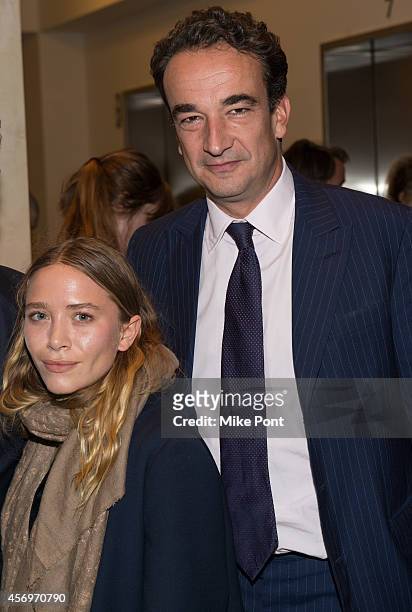 Actress Mary-Kate Olsen and Olivier Sarkozy attend the 2014 Take Home A Nude Event at Sotheby's on October 9, 2014 in New York City.
