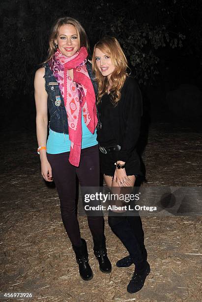 Actress Maitland Ward and actress Bella Thorne arrive for the Los Angeles Haunted Hayride held at Griffith Park on October 9, 2014 in Los Angeles,...