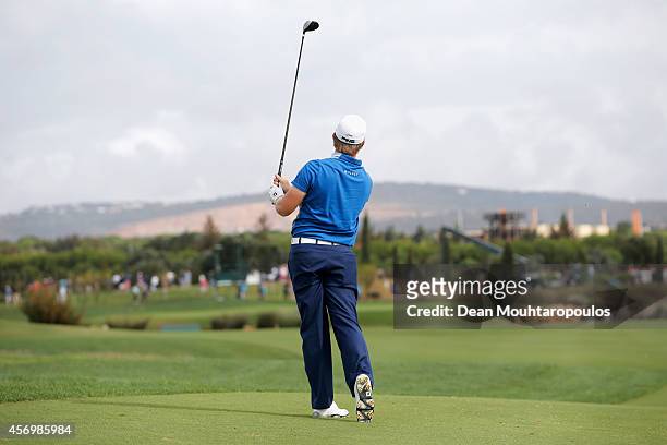 Tom Lewis of England hits his second shot on the 17th hole during Day 2 of the Portugal Masters held at the Oceanico Victoria Golf Course on October...