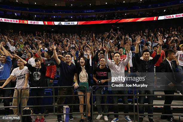 Fans cheers for the Sacramento Kings laughs during Fan Appreciation Day as part of 2014 Global Games on October 10, 2014 at the Mercedes-Benz Arena...