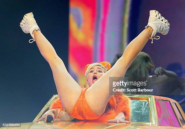 Miley Cyrus performs at the opening night of her Bangerz Tour in Australia at Rod Laver Arena on October 10, 2014 in Melbourne, Australia.