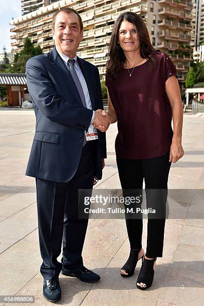 Antonio Caliendo and Mia Hamm, pose prior the Golden Foot Award press conference at Grimaldi Forum on October 10, 2014 in Monte-Carlo, Monaco.