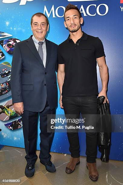 Antonio Caliendo and Hidetoshi Nakata pose during the Golden Foot Award press conference at Grimaldi Forum on October 10, 2014 in Monte-Carlo, Monaco.