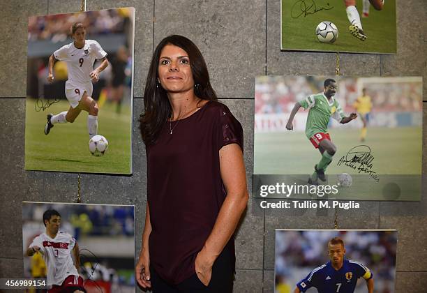 Mia Hamm poses after the Golden Foot Award press conference at Grimaldi Forum on October 10, 2014 in Monte-Carlo, Monaco.