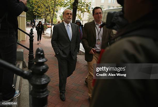 Former Chairman of the Federal Reserve Ben Bernanke arrives at U.S. Court of Federal Claims to testify at the AIG trial October 10, 2014 in...