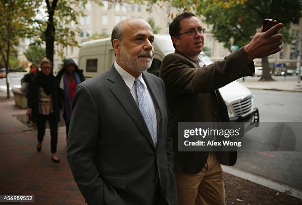 Former Chairman of the Federal Reserve Ben Bernanke arrives at U.S. Court of Federal Claims to testify at the AIG trial October 10, 2014 in...