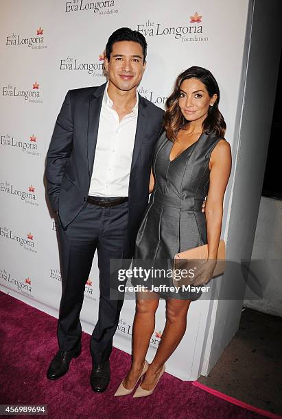 Personality Mario Lopez and wife/actress Courtney Laine Mazza attend Eva Longoria's Foundation dinner at Beso on October 9, 2014 in Hollywood,...