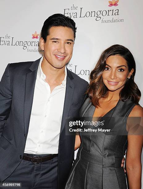 Personality Mario Lopez and wife/actress Courtney Laine Mazza attend Eva Longoria's Foundation dinner at Beso on October 9, 2014 in Hollywood,...