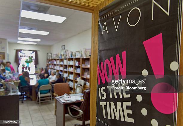 Avon Products Inc. Signage is displayed on a door during a weekly sales meeting in McAllen, Texas, U.S., on Thursday, Aug. 28, 2014. The top 10 U.S....