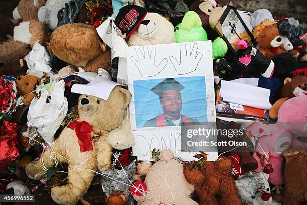 Makeshift memorial sits near the spot where 18-year-old Michael Brown was shot and killed by a police officer on October 10, 2014 in Ferguson,...