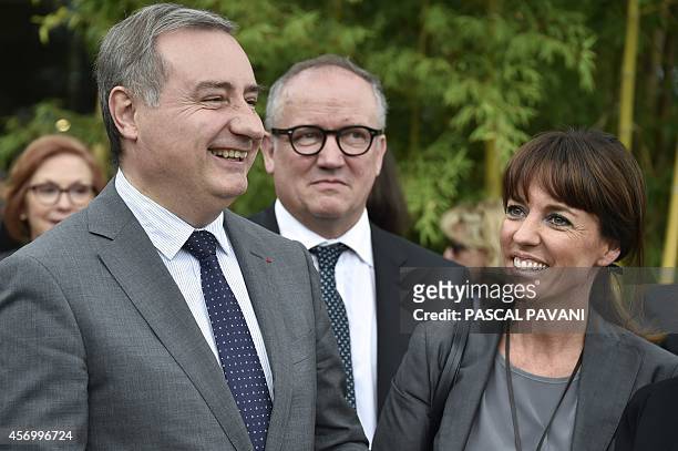 Toulouse mayor Jean-Luc Moudenc shares a laugh with French MP and Deputy Mayor of Toulouse Laurence Arribage during the inauguration of the Cancer...