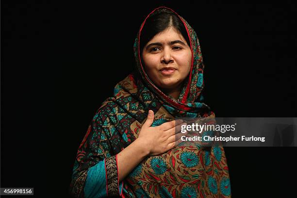 Malala Yousafzai speaks during a press conference at the Library of Birmingham after being announced as a recipient of the Nobel Peace Prize, on...
