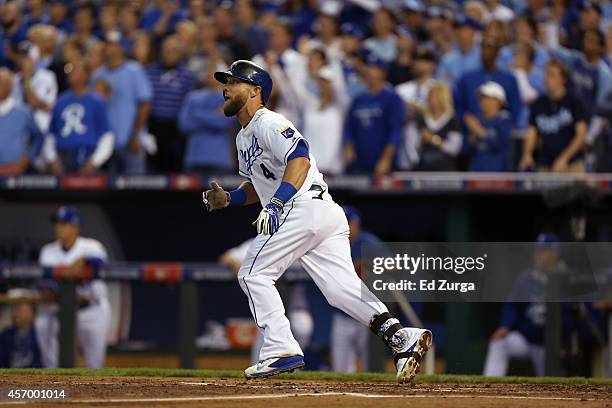 Alex Gordon of the Kansas City Royals hits a triple during a game against the Los Angeles Angels in Game Three of the American League Division Series...