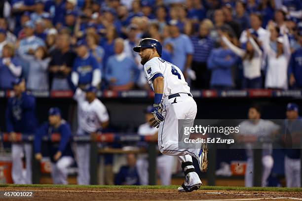Alex Gordon of the Kansas City Royals hits a triple during a game against the Los Angeles Angels in Game Three of the American League Division Series...