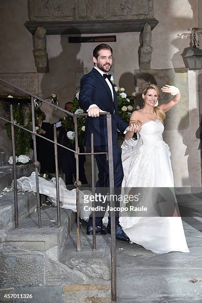 Michelle Hunziker and Tomaso Trussardi attend the Michelle Hunziker Wedding With Tomaso Trussardi at Palazzo della Ragione on October 10, 2014 in...