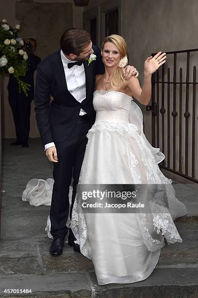 Michelle Hunziker and Tomaso Trussardi attend the Michelle Hunziker Wedding With Tomaso Trussardi at Palazzo della Ragione on October 10, 2014 in...