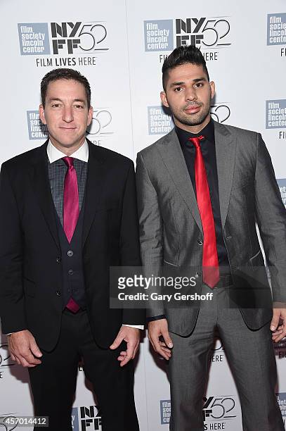 Glenn Greenwald and David Miranda attend the "Citizenfour" premiere during the 52nd New York Film Festival at Alice Tully Hall on October 10, 2014 in...
