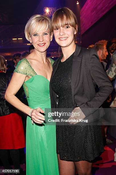 Andrea-Kathrin Loewig and guest attend Madeleine at Goldene Henne 2014 on October 10, 2014 in Leipzig, Germany.