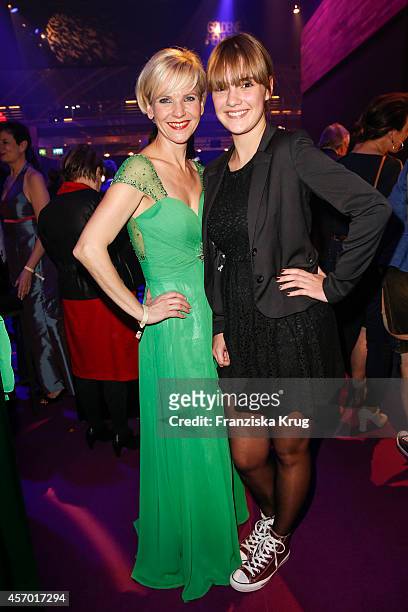 Andrea-Kathrin Loewig and guest attend Madeleine at Goldene Henne 2014 on October 10, 2014 in Leipzig, Germany.