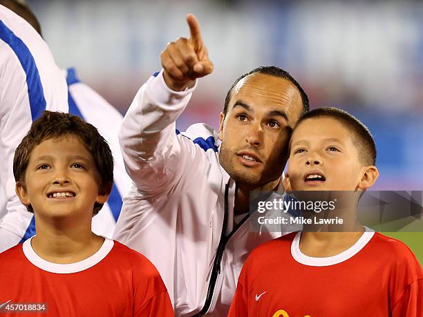 Landon Donovan of the United States points into the stands during pre-game against Ecuador during an international friendly at Rentschler Field on...