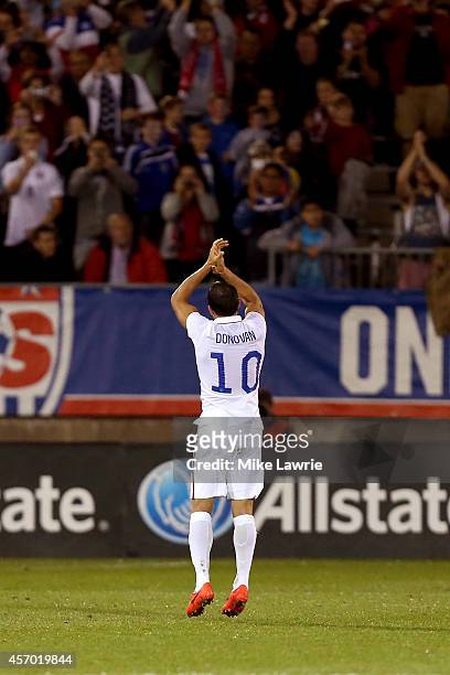 Landon Donovan of the United States applauds the fans as he is substituted against Ecuador during an international friendly at Rentschler Field on...