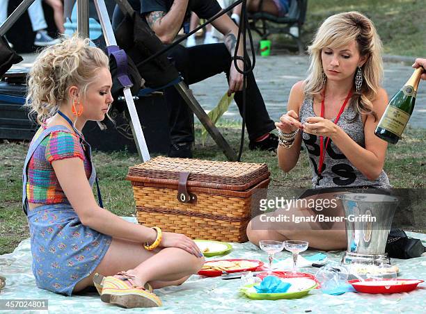 AnnaSophia Robb is seen filming "The Carrie Diaries" with Lindsey Gort on July 31, 2013 in New York City.