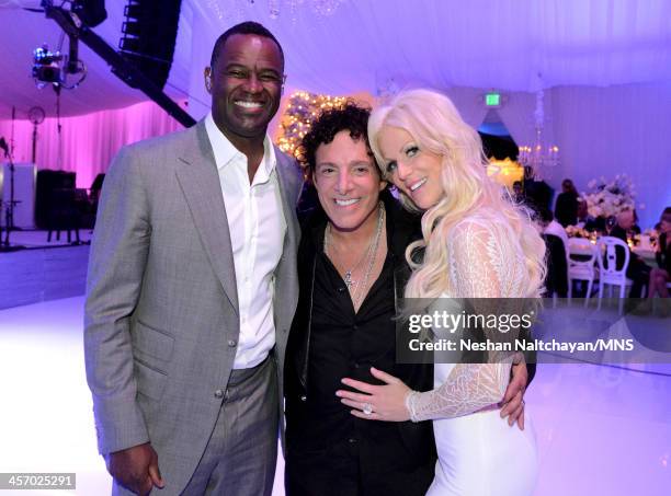 Brian McKnight, Neal Schon, and Michaele Schon attend the wedding of Michaele Schon and Neal Schon at the Palace of Fine Arts on December 15, 2013 in...