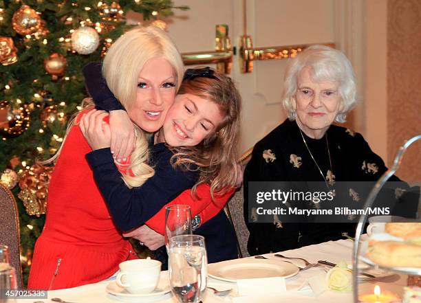 Michaele Schon, Lizzy Schon, and Rosemary Holt attend the bridal party tea for the wedding of Michaele Schon and Neal Schon at the Four Seasons Hotel...