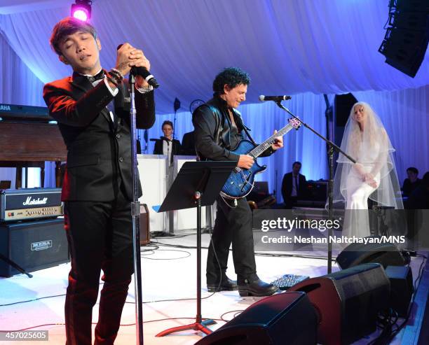 Arnel Pineda and Neal Schon perform for Michaele Schon during the wedding of Michaele Schon and Neal Schon at the Palace of Fine Arts on December 15,...