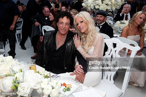 Neal Schon and Michaele Schon attend their wedding at the Palace of Fine Arts on December 15, 2013 in San Francisco, California.