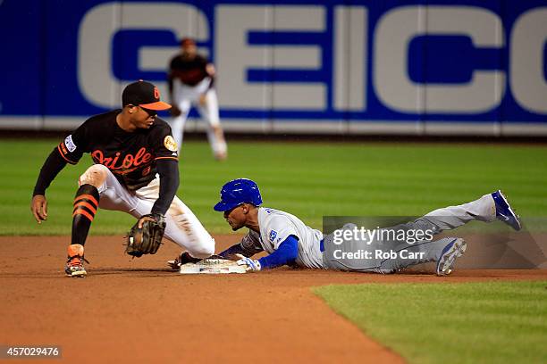 Jonathan Schoop of the Baltimore Orioles tags out Jarrod Dyson of the Kansas City Royals in the seventh inning during Game One of the American League...