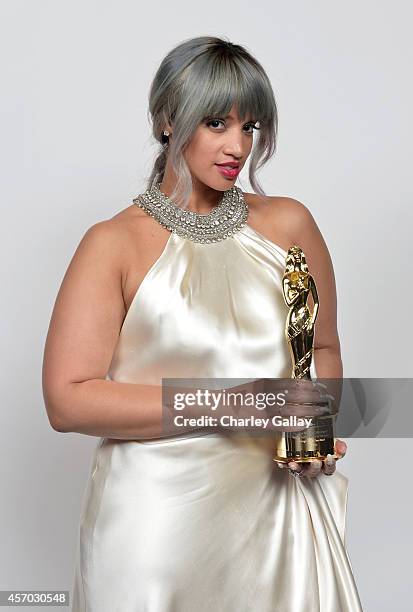 Actress Dascha Polanco, recipient of the Special Achievement In Television award poses for a portrait during the 2014 NCLR ALMA Awards at the...