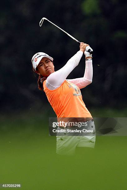 Jenny Shin of South Korea plays on the 9th hole during day three of the Sime Darby LPGA at Kuala Lumpur Golf & Country Club on October 11, 2014 in...