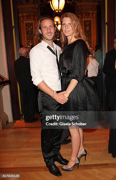 David Rott and his wife Elena attend the Hessian Film And Cinema Award 2014 on October 10, 2014 at Alte Oper in Frankfurt am Main, Germany.