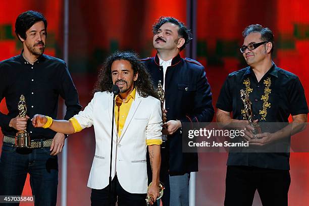 Musicians Emmanuel del Real, Ruben Isaac Albarran Ortega, Enrique Rangel and Joselo Rangel of Cafe Tacvba accept the NCLR ALMA de Tu Mundo Award...