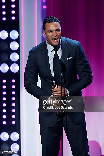 Football Player Tony Gonzalez speaks onstage at the 2014 NCLR ALMA Awards at Pasadena Civic Auditorium on October 10, 2014 in Pasadena, California.
