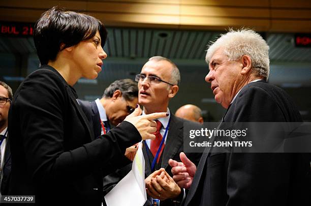 Italian Agriculture minister Nunzia De Girolamo talks with Greek counterpart Athanasios Tsaftaris and advisor before an Agriculture Council meeting...