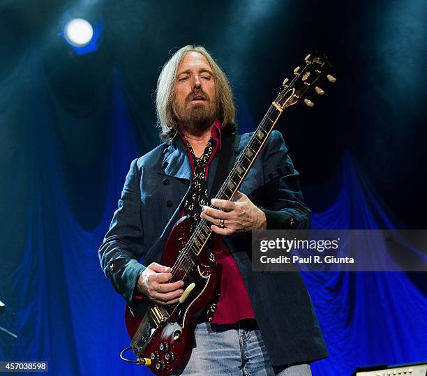 Tom Petty of Tom Petty And The Heartbreakers performs onstage at The Forum on October 10, 2014 in Inglewood, California.