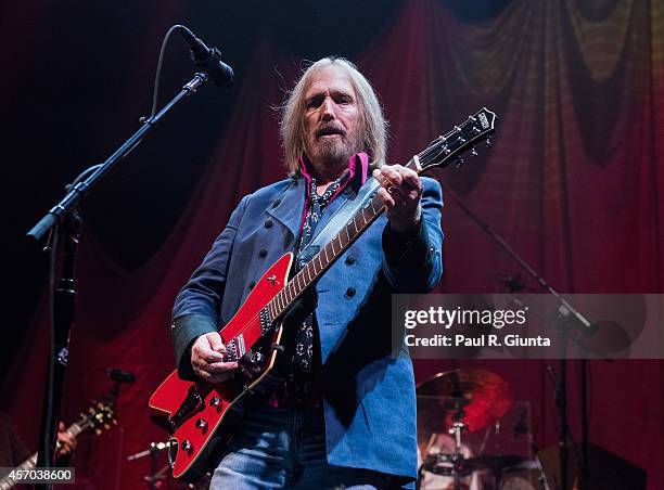 Tom Petty of Tom Petty And The Heartbreakers performs onstage at The Forum on October 10, 2014 in Inglewood, California.