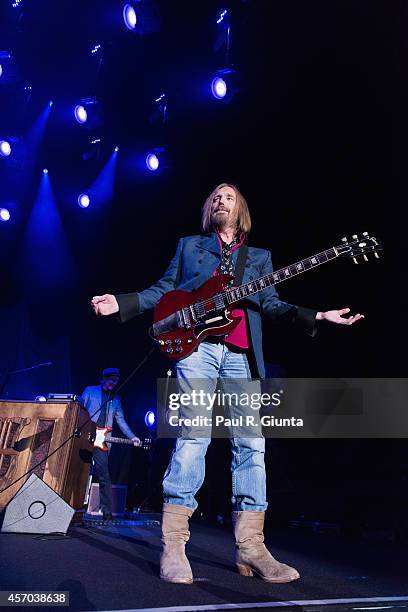 Tom Petty of Tom Petty And The Heartbreakers performs onstage at The Forum on October 10, 2014 in Inglewood, California.