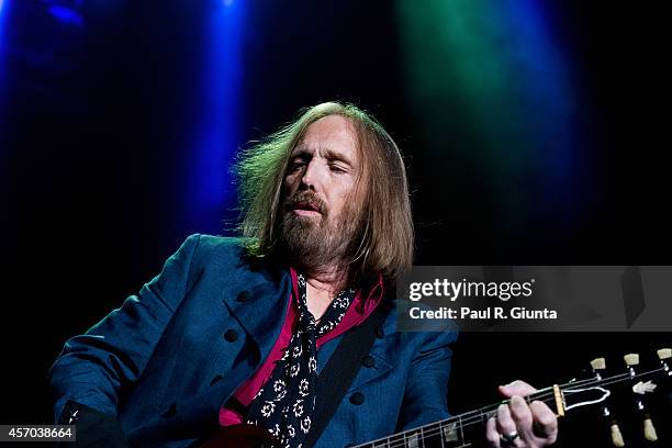 Tom Petty of Tom Petty And The Heartbreakers performs onstage at The Forum on October 10, 2014 in Inglewood, California.