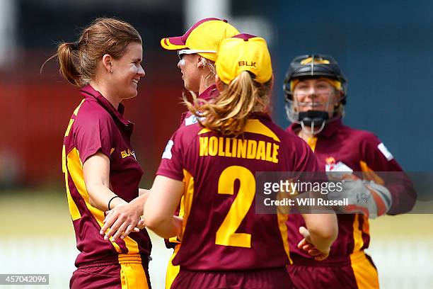 Jess Jonassen of The Queensland Fire celebrates after taking the wicket of Chloe Piparo of The Western Fury during the WNCL match between Western...