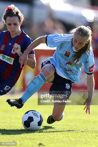 Teigen Allen of Sydney FC contests the ball against Rhali Dobson of the Jets during the round five W-League match between the Newcastle Jets and...