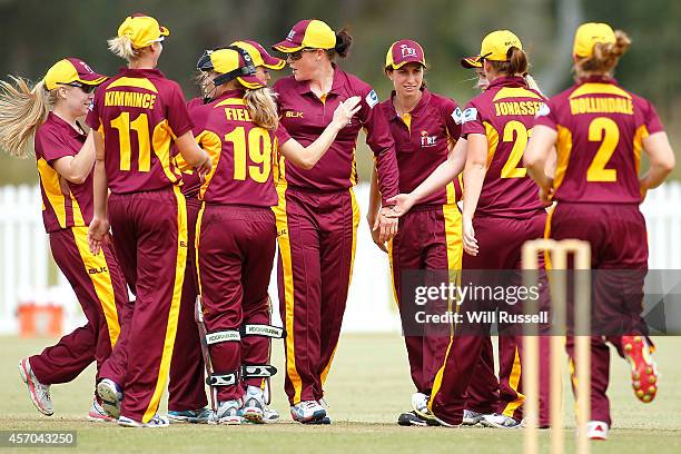 The Queensland Fire celebrate after taking the wicket of Emma Biss of The Western Fury during the WNCL match between Western Australia and Queensland...