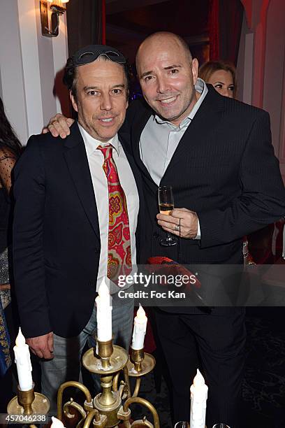 Philippe Vandel and Pierre Woodman and attend the Marc Dorcel 35th Anniversary Masked Ball at the Chalet des Iles on October 10, 2014 in Paris,...
