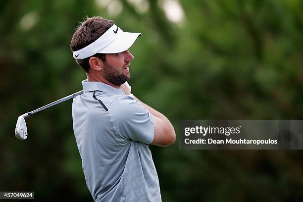 Scott Jamieson of Scotland hits his tee shot on the 8th hole during Day 3 of the Portugal Masters held at the Oceanico Victoria Golf Course on...