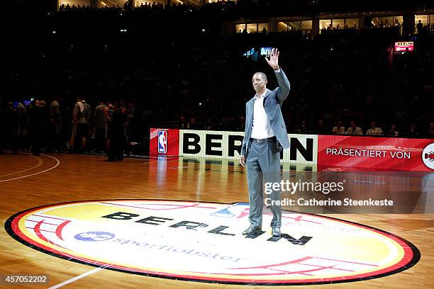 San Antonio Spurs legend Sean Elliott greets the crowd during a game as part of the 2014 Global Games on October 8, 2014 at the O2 Arena in Berlin,...