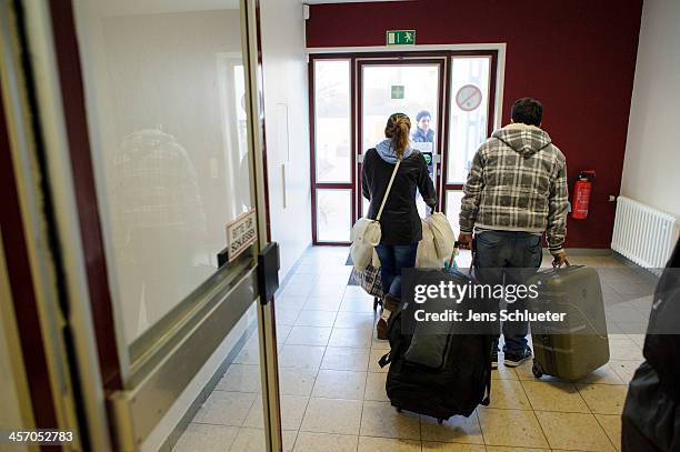 Unidentified Syrian refugees at the registration office of the refugee center on December 10, 2013 in Friedland, Germany. Hundreds of thousands of...