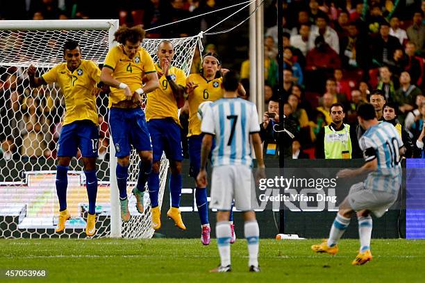 Lionel Messi of Argentina takes a free kick during a match between Argentina and Brazil as part of 2014 Superclasico de las Americas at Bird Nest...