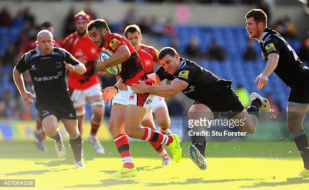 Falcons player Mark Wilson tackles Welsh player Olly Barkley during the Aviva Premiership match between London Welsh and Newcastle Falcons at Kassam...